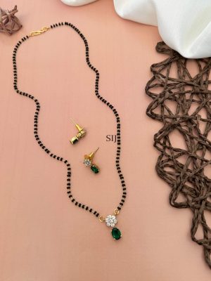 Single Layer Black Beads Mangalsutra With Green AD Stone Pendant