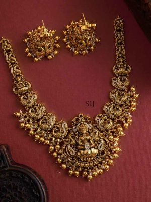 Lakshmi with Peacock Nakshi Golden Beads Dropped Necklace Set