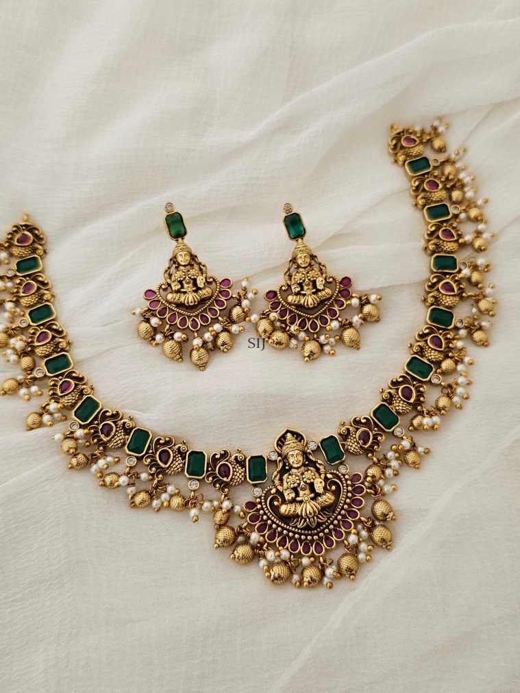 Gold Finish Emerald Stones and Peacock Necklace with Mahalakshmi Pendant