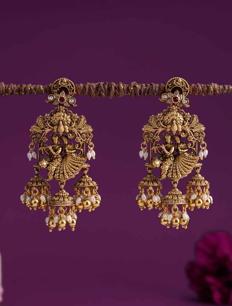 Antique Finish Radha Krishna Earrings with Three Jhumkas