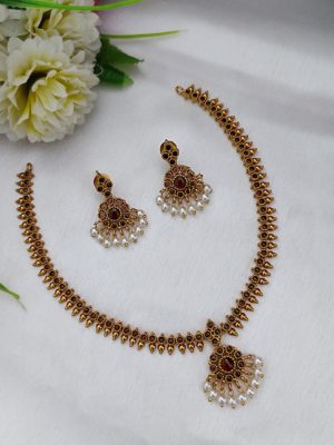 Gold Finish Red Stones Attigai Necklace
