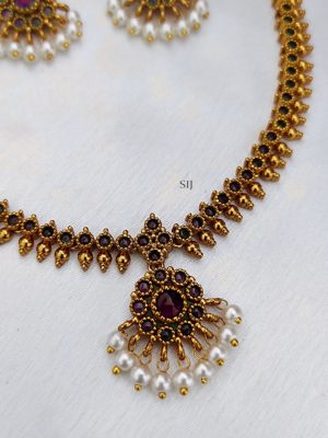Gold Finish Red Stones Attigai Necklace
