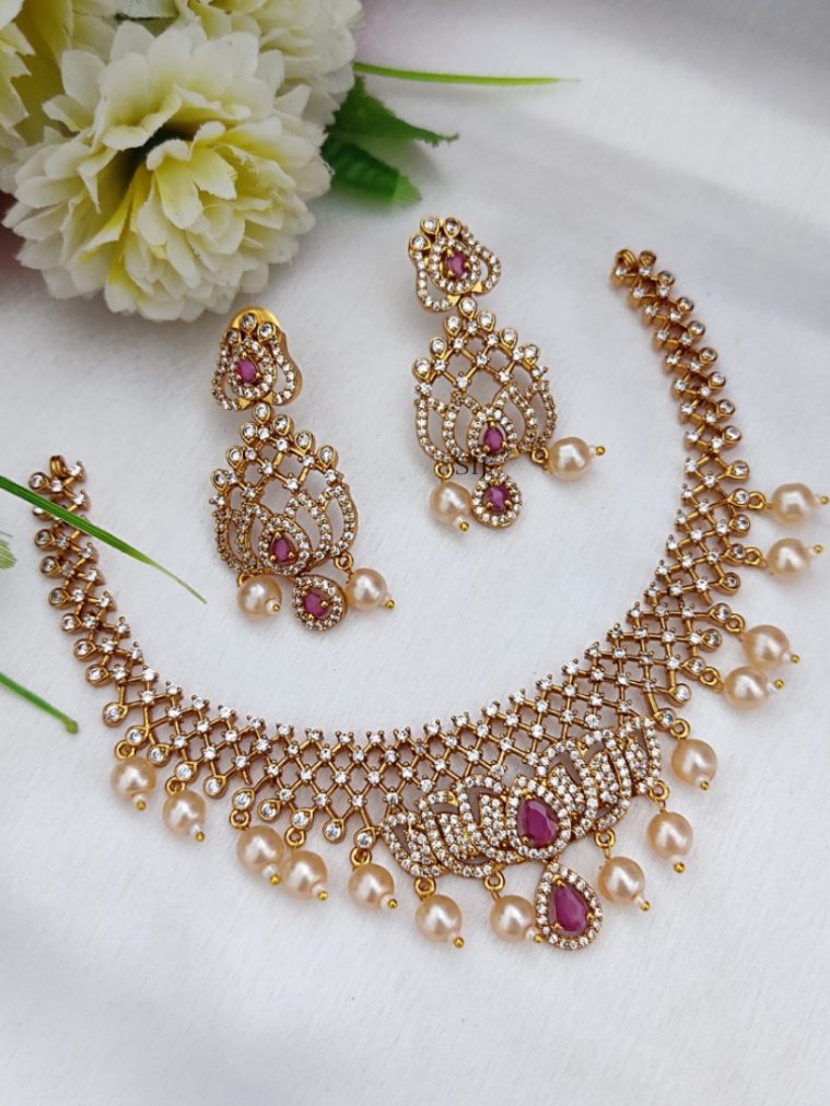 Gold Finish White Stones Flower Design Necklace with Pearl Hanging