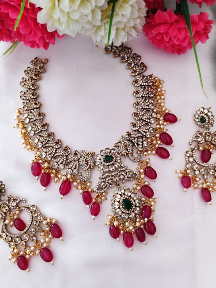 Gold Finish Peacock White Stones Beaded Necklace