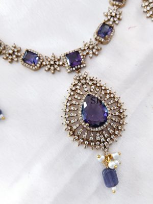 Gold Finish White And Grey Stones Necklace