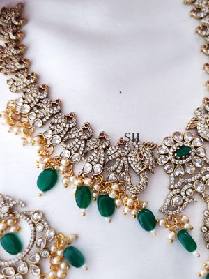Gold Finish Peacock White And Emerald Stones Beaded Necklace