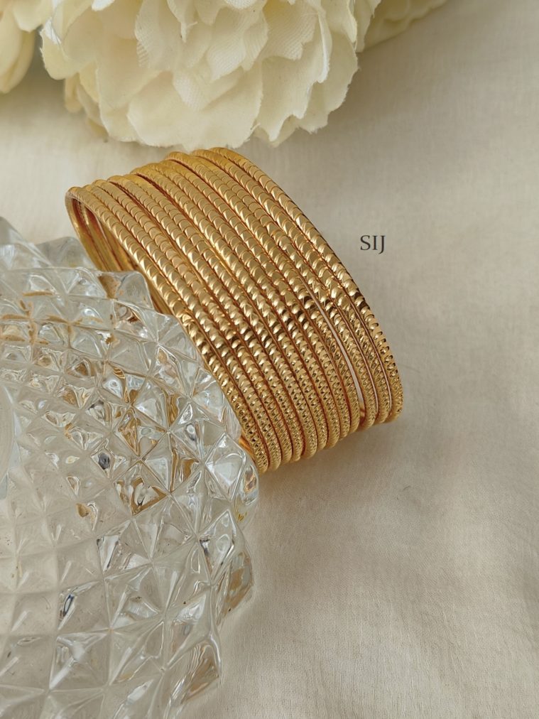 Set of 12 Gold Replica Bangles DHEIB02497